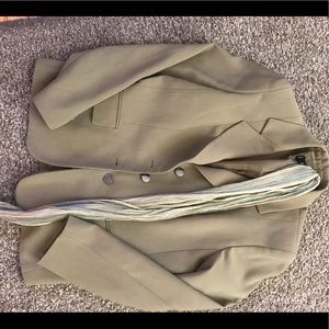 Woman’s two piece suit, olive green with scarf.